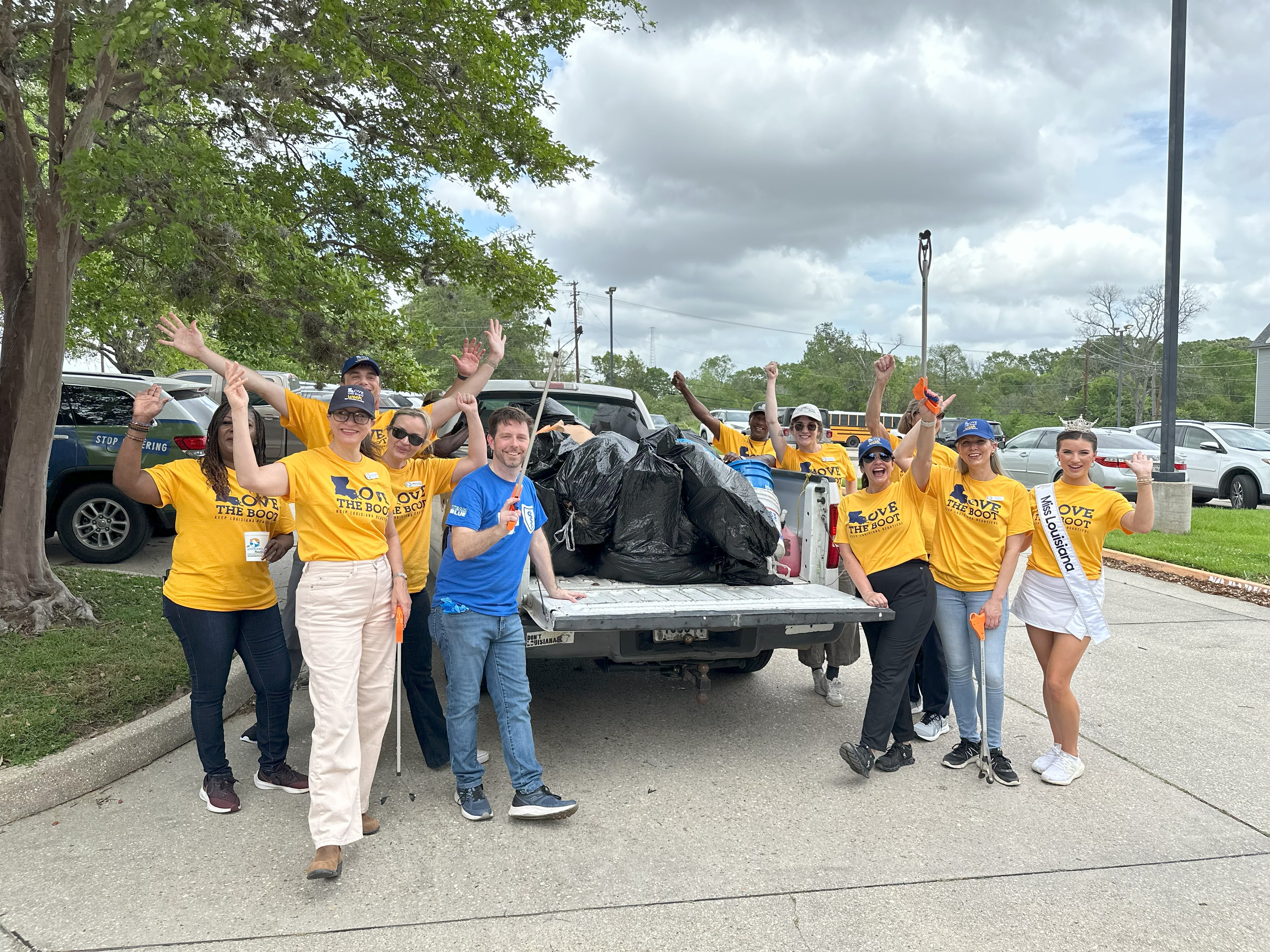 2025 Love the Boot Week group shot of volunteers at Baton Rouge cleanup event. 