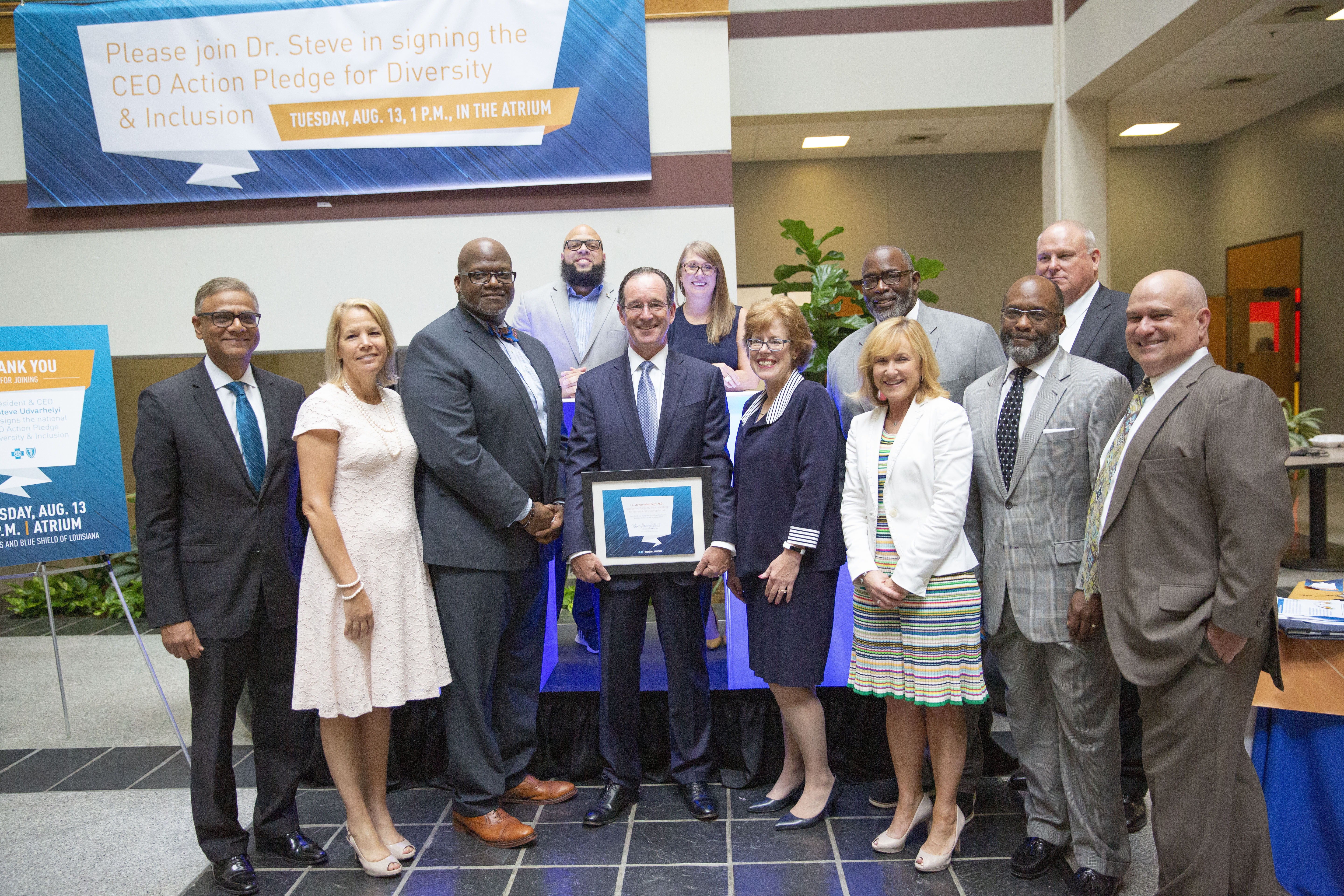 A group of senior Blue Cross executives pose for a picture at the CEO Action Pledge for Diversity & Inclusion event.
