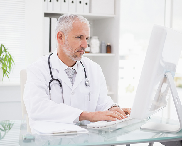 Doctor working on a computer